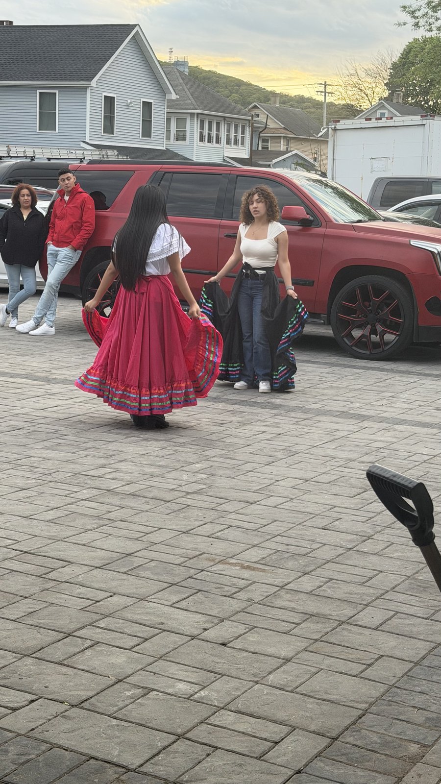 Folklórico dancers practicing with traditional skirts