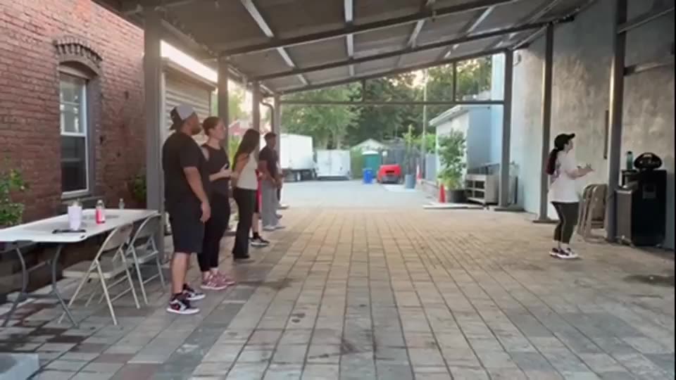 Community members dancing at a free HVLBC Zumba class at La Placita